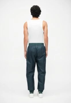 EA7 Emporio Armani TRAIN GRAPHIC SERIES PANTS MONOGRAM - Tracksuit Bottoms - Dark Green Fancy -Total Wear Store 085e44bc836e4ef2b638283397300d14