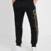 EA7 Emporio Armani Trouser - Tracksuit Bottoms - Black/Gold 1 EA7 Emporio Armani Trouser - Tracksuit Bottoms - Black/Gold -Total Wear Store 09b61c1bfdcd4d71a12bccd4b7d2c527