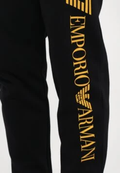 EA7 Emporio Armani TRAIN LOGO SERIES PANTS - Tracksuit Bottoms - Black/gold Coloured -Total Wear Store 0c7df8e3315849c1a5c0d950b37e3344