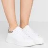 Emporio Armani Trainers - White/Ecru -Total Wear Store 0d92ea4459714c03b182167f0601de41