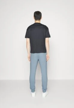 EA7 Emporio Armani Trouser - Tracksuit Bottoms - Light Blue -Total Wear Store 0dd62005e2654ee59fd6e107f57dca21
