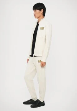 EA7 Emporio Armani TRAIN LABEL ALCANTARA - Tracksuit Bottoms - Rainy Day -Total Wear Store 0f6fe72bda6c4e7f8316bfabb3b441e5