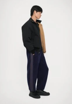 EA7 Emporio Armani TRAIN PANTS UNISEX - Tracksuit Bottoms - Evening Blue -Total Wear Store 150f48e5ae2c42d8a25625de495d1a26