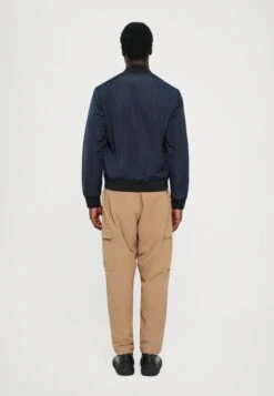 EA7 Emporio Armani TRAIN PREMIUM JACKET - Light Jacket - Blue -Total Wear Store 194998ce862b42efa5ceaace0ea9ab65