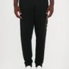 EA7 Emporio Armani TRAIN LOGOSERIES - Tracksuit Bottoms - Black