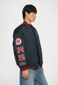 EA7 Emporio Armani TRAIN GRAPHIC SERIES JACKET HOCKEY - Bomber Jacket - Blue -Total Wear Store 376d70842e6945e2b21f0ba9565bf594