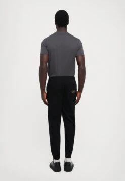 EA7 Emporio Armani TRAIN LOGO SERIES PANTS - Tracksuit Bottoms - Black/gold Coloured -Total Wear Store 42551d1ccddb4505965df591ab3fcf6a