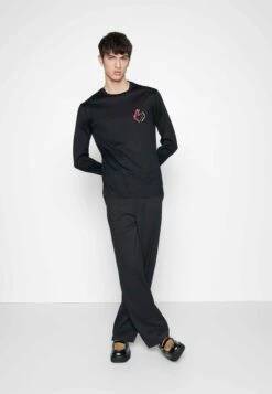 Emporio Armani Long Sleeved Top - Nero 8 Emporio Armani Long Sleeved Top - Nero -Total Wear Store 44e737099f0f461bb8676c68bfeaccef