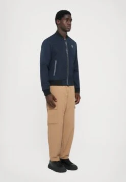 EA7 Emporio Armani TRAIN PREMIUM JACKET - Light Jacket - Blue -Total Wear Store 465585c88d0f44439809ab4ecd60aa8e