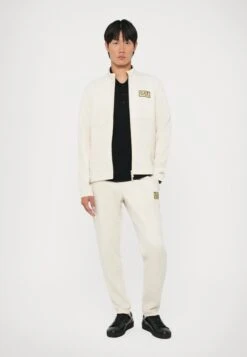 EA7 Emporio Armani TRAIN LABEL ALCANTARA - Tracksuit Bottoms - Rainy Day -Total Wear Store 479f3a343abd46899c060a4f4400c349