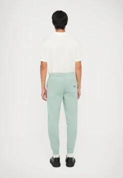 EA7 Emporio Armani TRAIN LOGO SERIES PANTS - Tracksuit Bottoms - Blue Surf -Total Wear Store 47e3d762f7114dcfa6819d461a89964f