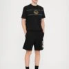 EA7 Emporio Armani TRAIN LOGO SERIES TEE UNISEX - Print T-shirt - Black/gold Coloured -Total Wear Store 48907ee628ff4a98896f01bac2401e3a