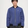 EA7 Emporio Armani TRAIN PREMIUM SHIELD JACKET - Light Jacket - Blue -Total Wear Store 48c10dc1bc63413aa4f92ca822828085