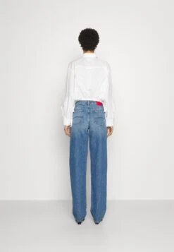 Emporio Armani Bootcut Jeans - Blue Denim -Total Wear Store 4e3a53eee73744b79c15c0520a274cc2