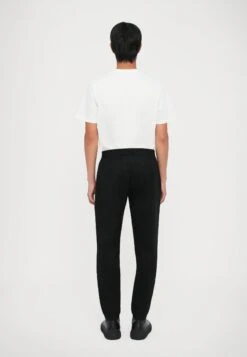 EA7 Emporio Armani TRAIN LABEL ALCANTARA - Tracksuit Bottoms - Black -Total Wear Store 502e072e782442f7846d03392c5264e0