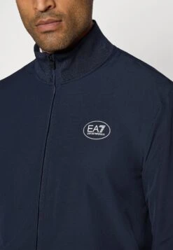 EA7 Emporio Armani GOLF PRO TECH - Training Jacket - Blue -Total Wear Store 58f6619f1f6c48d4aeaa566470aa321c