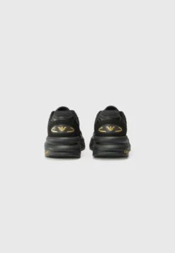 EA7 Emporio Armani CRUSHER SONIC UNISEX - Trainers - Triple Black/gold-coloured -Total Wear Store 615cfa0d225b4013ab90288a4a2944b3