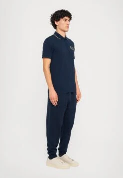 EA7 Emporio Armani TRAIN LABEL - Polo Shirt - Blue -Total Wear Store 6b974df9bea746bba0b01c67a6461813