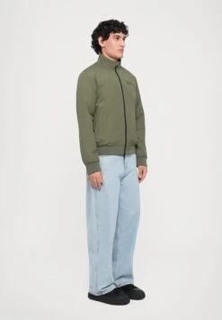 EA7 Emporio Armani TRAIN CORE JACKET - Winter Jacket - Beetle -Total Wear Store 6e7e212dc0f14d9b860b417498c53351