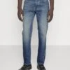 Emporio Armani Slim Fit Jeans - Denim Blue -Total Wear Store 6efc0b4af9224ccaba18704982a57372