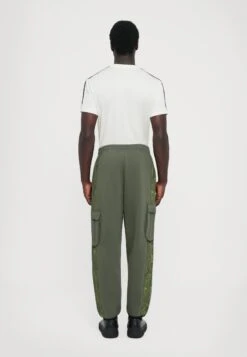 EA7 Emporio Armani TRAIN LOGO PANT - Tracksuit Bottoms - Beetle -Total Wear Store 6fb10f5098874e1c9e4e69281fdc896d