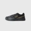 EA7 Emporio Armani PREMIUM COURT UNISEX - Trainers - Triple Black/gold-coloured 2 EA7 Emporio Armani PREMIUM COURT UNISEX - Trainers - Triple Black/gold-coloured -Total Wear Store 70681a55870c4bc8b1f025397b21ac84 1