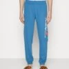 EA7 Emporio Armani Trouser - Tracksuit Bottoms - Blue -Total Wear Store 75a582888c2b4b30bd0a02024890d25a