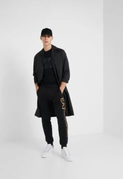 EA7 Emporio Armani Trouser - Tracksuit Bottoms - Black/Gold -Total Wear Store 7d4d823b2c404ab5ab52d928b49d3c2d