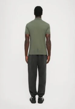 EA7 Emporio Armani TRAIN CORE - Polo Shirt - Beetle -Total Wear Store 814c70bd272842669b297b28ed03d693