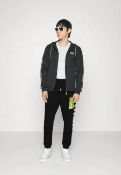 EA7 Emporio Armani Trouser - Tracksuit Bottoms - Black -Total Wear Store 84032322d0a44bfc94b354fa6cf0cc44