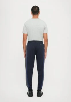 EA7 Emporio Armani ATHLETIC PANTS - Tracksuit Bottoms - Blue -Total Wear Store 86aeb2ebdab04dea821e125e08bf2343
