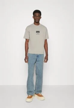 Emporio Armani Relaxed Fit Jeans - Denim Blue -Total Wear Store 886065034adc47a78f26acab6d51c610