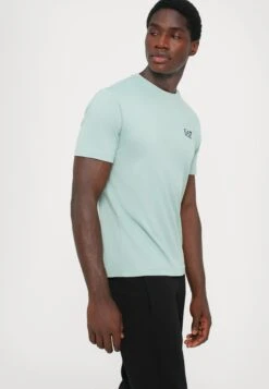 EA7 Emporio Armani TRAIN CORE TEE - Basic T-shirt - Blue Surf -Total Wear Store 897605c9cf984791be0386affa2e0b1b