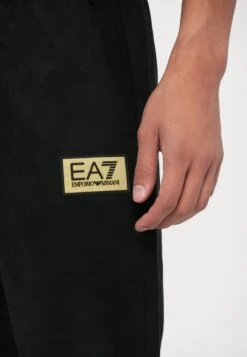 EA7 Emporio Armani TRAIN LABEL ALCANTARA - Tracksuit Bottoms - Black -Total Wear Store 8cc14b0253b1449594d7d946056e9edf