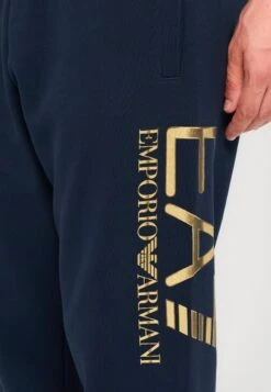 EA7 Emporio Armani TRAIN LOGOSERIES - Tracksuit Bottoms - Blue -Total Wear Store 8f141003a0b645688d73cd75ae5654dc
