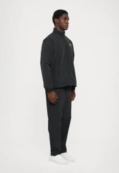 EA7 Emporio Armani TRAIN CORE - Tracksuit Bottoms - Black -Total Wear Store 8f1fcb37502a49588fd980d3f4a2e6cc