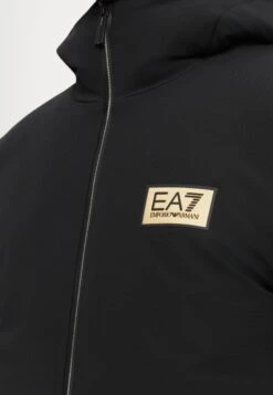 EA7 Emporio Armani TRAIN LABEL JACKETS - Winter Jacket - Black -Total Wear Store 8f7f52f484ed4a70970e736d5d5e1e76