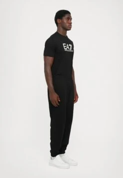 EA7 Emporio Armani TRAIN VISIBILITY - Tracksuit Bottoms - Black/cream -Total Wear Store 9168ccb71dce4b6592af464b1e848c6a