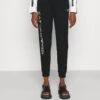 EA7 Emporio Armani Trouser - Tracksuit Bottoms - Black/White -Total Wear Store 97af58b24aa049e58fdc9d3b8cba23a8