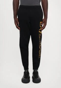 EA7 Emporio Armani TRAIN LOGO SERIES PANTS - Tracksuit Bottoms - Black/gold Coloured