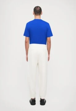 EA7 Emporio Armani TRAIN CORE PANTS UNISEX - Tracksuit Bottoms - Vanilla Ice -Total Wear Store 9c280c46e35e4fb49b206d19cee58086