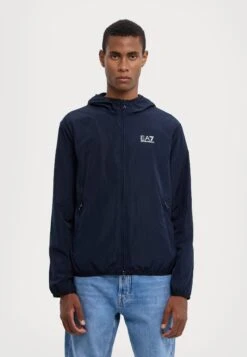 EA7 Emporio Armani TRAIN CORE JACKET - Light Jacket - Armani Blue -Total Wear Store a7c684d05867496a8780fe00676a9b57