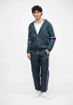 EA7 Emporio Armani TRAIN GRAPHIC SERIES PANTS MONOGRAM - Tracksuit Bottoms - Dark Green Fancy -Total Wear Store a95fd24d338c4e62b615000eed3ef406