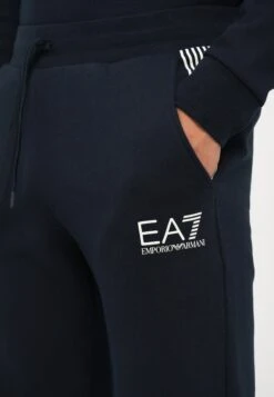 EA7 Emporio Armani TRAIN LINES - Tracksuit Bottoms - Blue -Total Wear Store b1408ce6d8184bf69d84f5a846da0eff