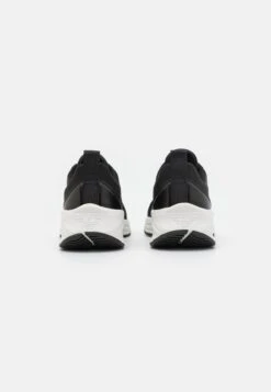 EA7 Emporio Armani Future Unisex - Trainers - Black/White -Total Wear Store b2129ea1b8664abba3f8692c76fc0a83