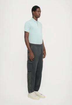 EA7 Emporio Armani TRAIN LOGO PANT - Tracksuit Bottoms - Asphalt -Total Wear Store b3885e7e924242ee90838fb87c766b68