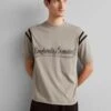 Emporio Armani Print T-Shirt - Greige 1 Emporio Armani Print T-Shirt - Greige -Total Wear Store b54b359c29d94e57a6f1b165fe0df3e5