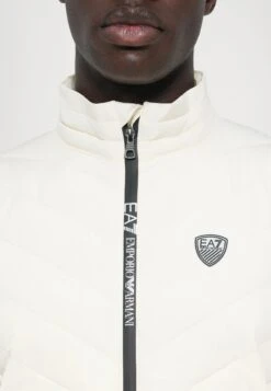 EA7 Emporio Armani TRAIN PREMIUM SHIELD VEST - Waistcoat - Vanilla Ice -Total Wear Store b959b63b77464cacab437d102df7733e