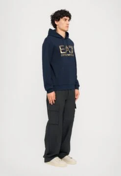 EA7 Emporio Armani TRAIN LOGO SERIES HOODIE - Sweatshirt - Blue -Total Wear Store bb60c7290e604acbacbec51eec40e673
