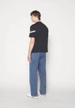 Emporio Armani 5 Pockets Pant - Relaxed Fit Jeans - Denim Blu -Total Wear Store c04913c24843465fa2e9ec3d1901a39c